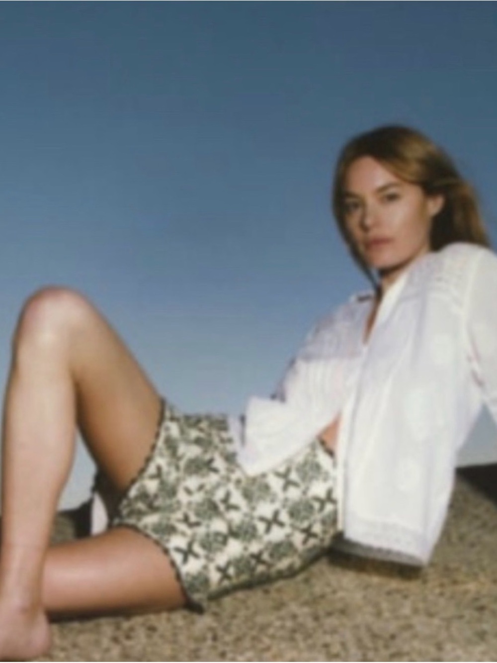 Zara White Embroidered Button-Up Blouse with Patterned Olive Shorts